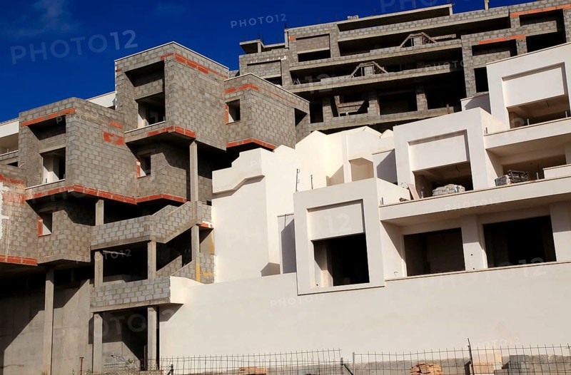 Concrete shells of uncompleted housing in the Castillo development, Caleta de Fuste, Fuerteventura, Canary Islands, Spain, Europe
