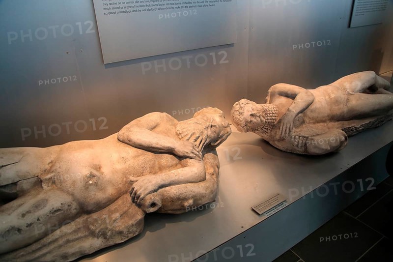 Reclining Sileni figure sculptures in museum, Baelo Claudia Roman site, Cadiz Province, Spain, Europe