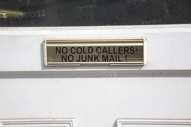 Notice on house letter box 'No cold callers no junk mail, UK