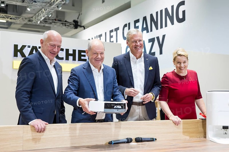 Kai Wegner (Governing Mayor of Berlin, CDU), Olaf Scholz (Chancellor of the Federal Republic of Germany, SPD) and Franziska Giffey (Senator for Economics, Energy and Public Enterprises and Mayor of Berlin, SPD) are shown robotic vacuum cleaners from Kärcher during a press tour of the IFA (Internationale Funkausstellung) exhibition at the exhibition grounds, Berlin, 06/09/2024