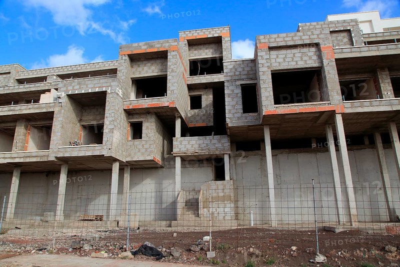 Concrete shells of uncompleted housing in the Castillo development, Caleta de Fuste, Fuerteventura, Canary Islands, Spain, Europe