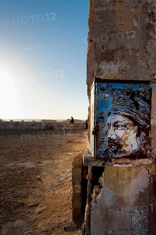 Fortress wall with picture of Jimi Hendrix, evening mood in the harbour town of Essaouira, Morocco, Africa
