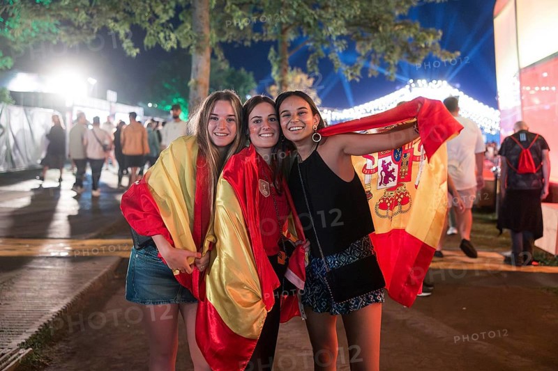 Fans of the Spanish team pose after the 2:1 victory against England at the Adidas fan zone at the Bundestag after the final match between Spain and England at the European Football Championship, Berlin, 14 July 2024