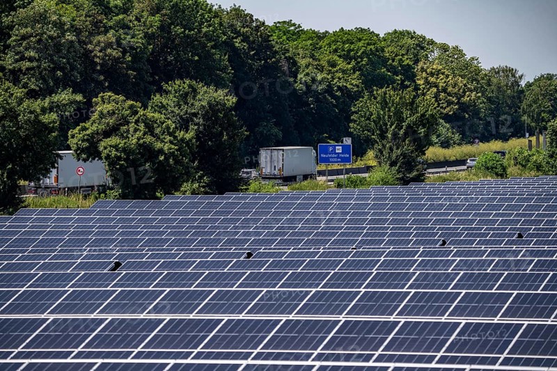 Solar park near Neukirchen-Vluyn, along the A40 motorway, over 10, 000 solar modules spread over 4.2 hectares, generating 6 million kilowatt hours per year, North Rhine-Westphalia, Germany, Europe