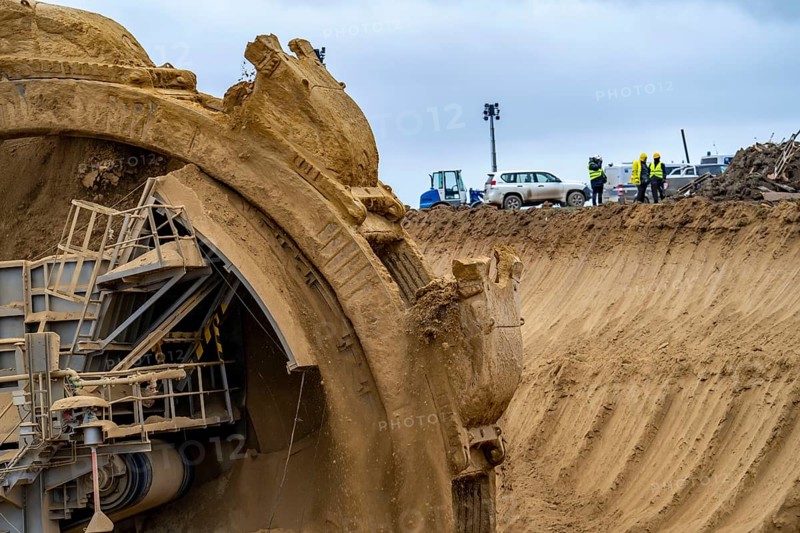 Opencast lignite mine Garzweiler 2, bucket wheel excavator 261 excavating the surface, at the rest of the hamlet Lützerath, bucket diameter is 17 metres, Erkelenz, North Rhine-Westphalia, Germany, Europe