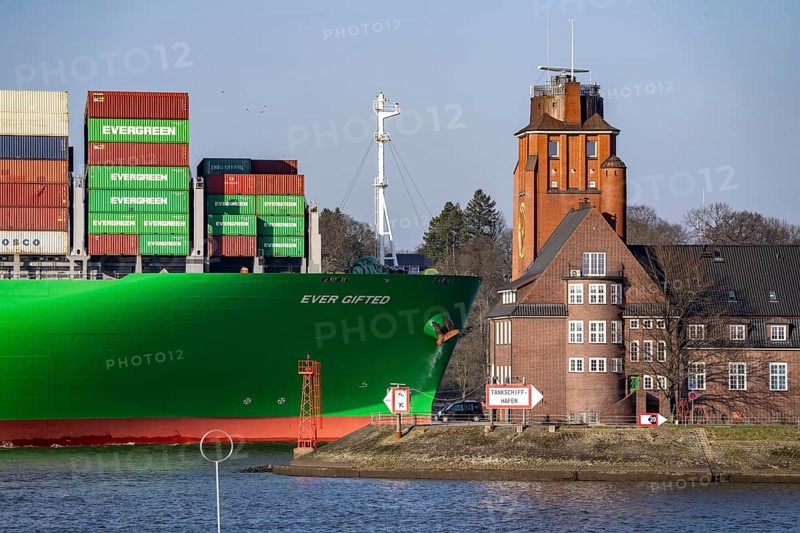 Container ship Ever Gifted, enters the port of Hamburg on the Elbe, shipping company Evergreen, Singapore, 399 m long, can carry over 20, 000 containers, Seemannshöft pilot house, nautical centre, Hamburg, Germany, Asia