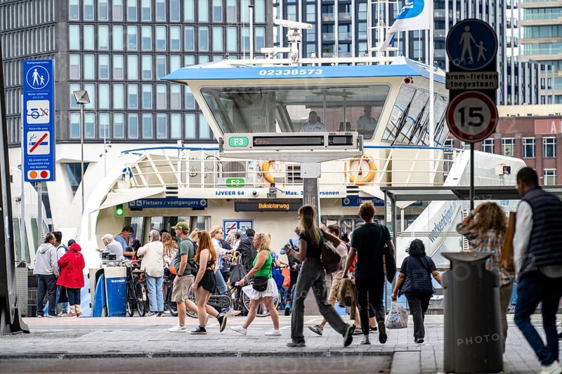 GVB ferries for pedestrians and cyclists across the river Ij, at Amsterdam Centraal station, free of charge, to the eastern parts of the city, Netherlands