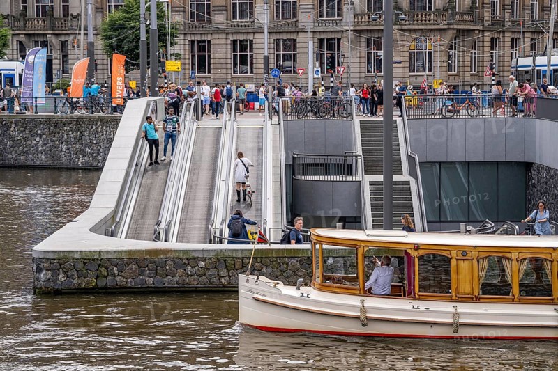 New bicycle car park at Amsterdam Central Station, Stationsplein, space for around 7000 bicycles, largest in Amsterdam, digitally monitored, underground, direct connection to the station and metro, Netherlands, escalators lead to the bicycle garage, Netherlands