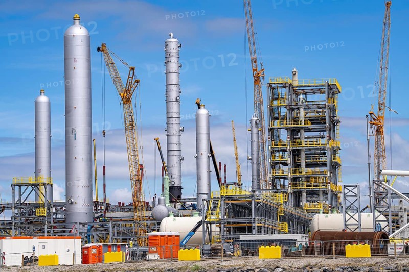 New building, construction site, of a bio-refinery of the Finnish oil company Neste, here, among other things, sustainable bio aviation fuels are to be produced, construction site in the harbour Maasvlakte 2, in Rotterdam, Netherlands