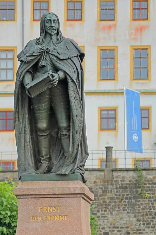 Monument to Duke Ernst I the Pious of Saxe-Gotha-Altenburg, sculpture with book and inscription, Gotha, Thuringia, Germany, Europe