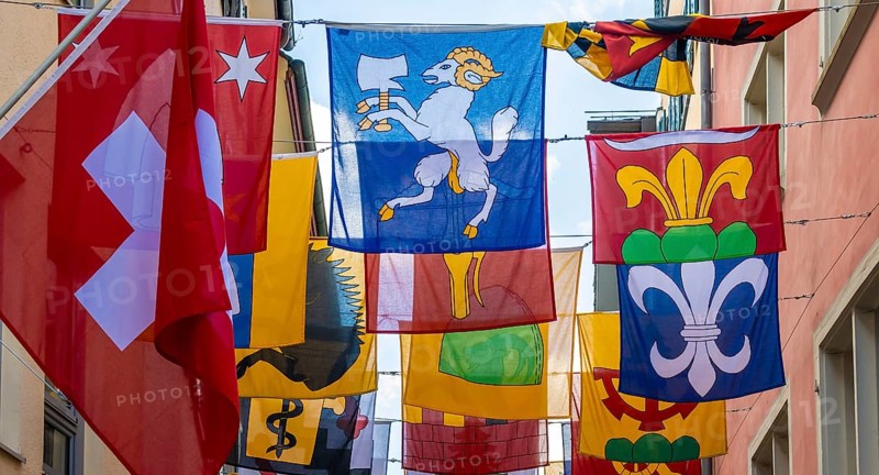Augustinergasse with Swiss flags, Old Town, Zurich, Switzerland, Europe