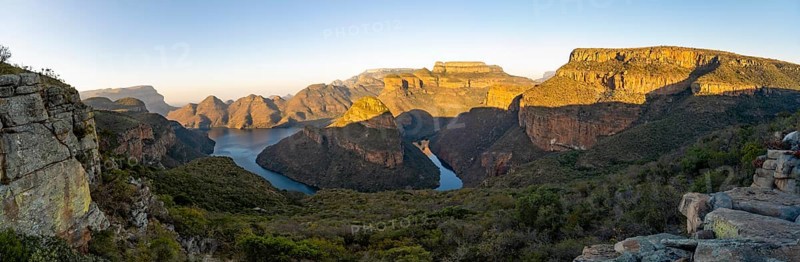 Panorama, sunset at Blyde River Canyon with Three Rondawels peak, view of canyon with Blyde River and Mesa Mountains in the evening light, canyon landscape, Panorama Route, Mpumalanga, South Africa, Africa