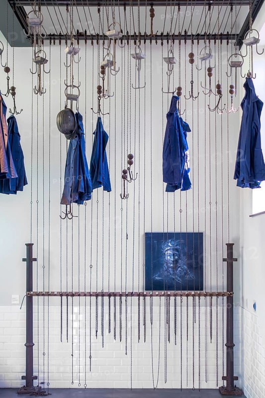 Changing room with pulleys and chains to hoist coal miners clothes at Le Bois du Cazier, coal mining museum at Marcinelle, Charleroi, Hainaut, Belgium, Europe