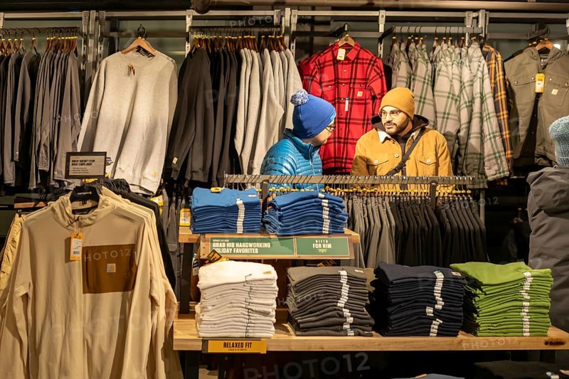 Detroit, Michigan - People shop at a Carhartt store on Noel Night. The annual Noel Night at the beginning of the holiday season in Detroit features open houses by arts and cultural institutions, churches, and small businesses.