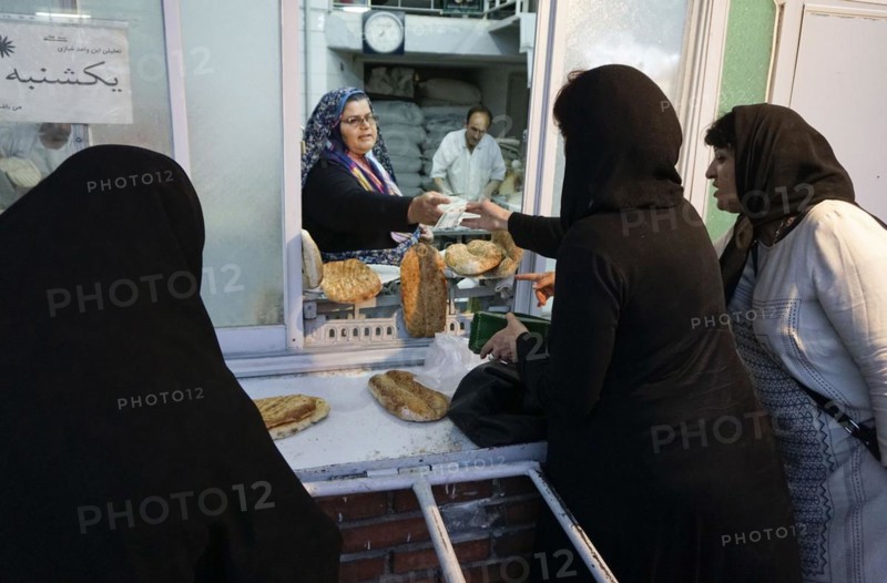 Sale of fresh bread, Barbol, Iran, 18/05/2016, Asia