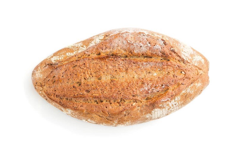 Fresh homemade golden bread with different seeds isolated on white background. top view, close up, flat lay