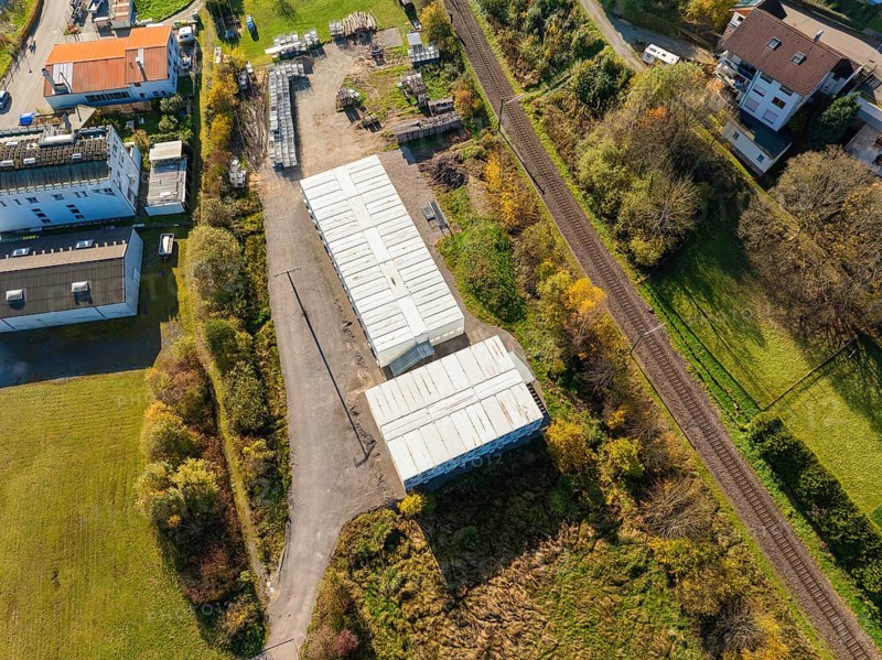 Industrial facilities in a rural area near railway lines, refugee accommodation Beermiß, Calmbach, Black Forest, Germany, Europe
