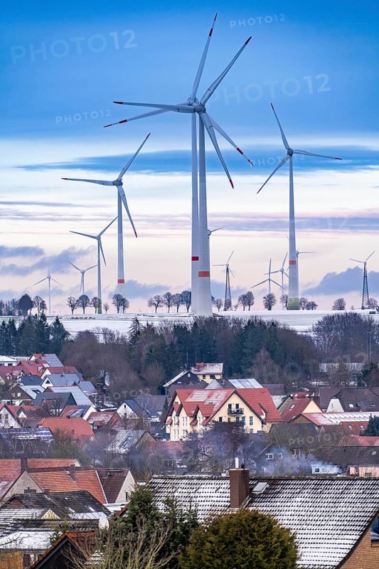 The town of Lichtenau, self-proclaimed energy town, wind farm, over 190 wind turbines and over 1200 solar panels generate 10 times as much electricity as the community of 11, 900 inhabitants consumes, largest onshore cluster of wind turbines in Germany, winter, slightly snow-covered landscape, North Rhine-Westphalia, Germany, Europe