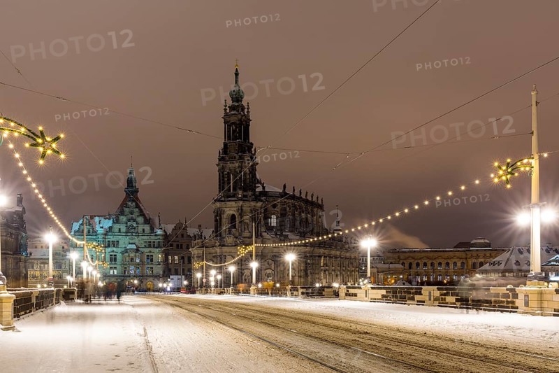 Christmas illumination on the Augustus Bridge in the snow, view to the castle square with St George's Gate and Court Church, Dresden, Saxony, Germany, Europe