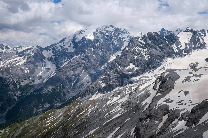Stilfserjoch, Vinchgau, South Tyrol, Italy, mountain landscape on the Ortler, Italian Alps, snowy landscape on the Stilfser Joch pass road The Ortler Alps in Vinschgau with their almost 100 glaciers are a mountain massif about 50 kilometres long and 40 kilometres wide, Europe