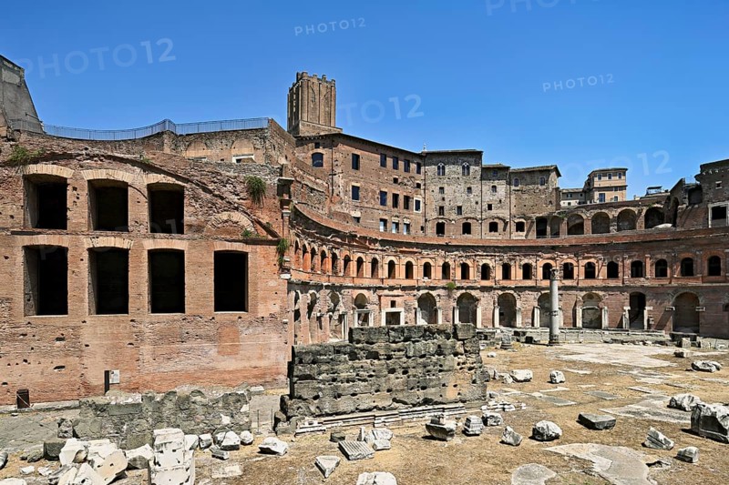 View of historic Traian's Forum Forum of Traian Foro Traiano from antiquity with building in semicircle at the back with colonnade in the foreground forecourt open space with column fragments remains of marble columns, Rome, Lazio, Italy, Europe