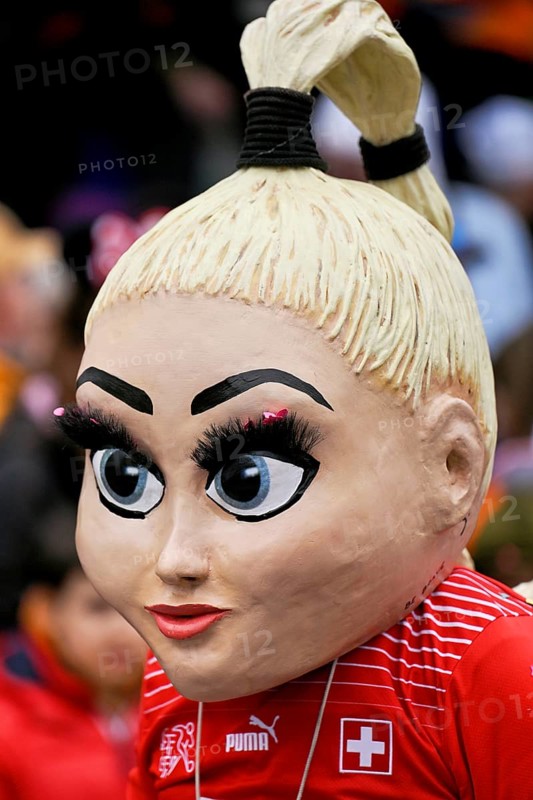 Person masked as footballer Alisha Lehmann at the carnival parade of the Wey guild on Rose Monday, Güdismäntig, Lucerne Carnival 2024, Lucerne, Switzerland, Europe