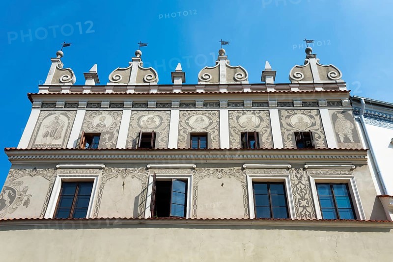 Close-up of a historic building with decorated facade under a clear blue sky, Chociszewska tenement house, Old Town, Lublin, Poland, Europe