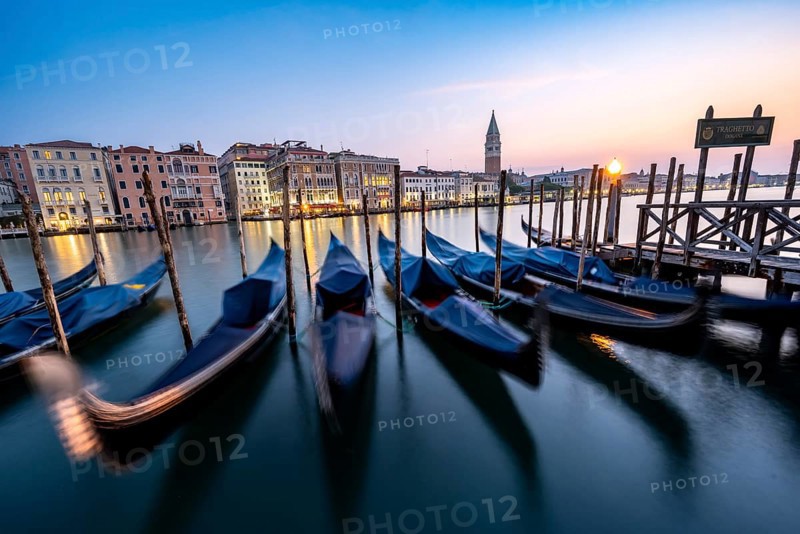 Venetian gondolas, boat dock at the customs office on the Grand Canal, Gondola Traghetto Dogana, Campanile behind, long exposure at sunrise, Venice, Veneto, Italy, Europe