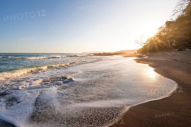 Sandy beach beach and sea at sunset, Playa Cocalito, coastal landscape, Pacific coast, Nicoya Peninsula, Puntarenas Province, Costa Rica, Central America