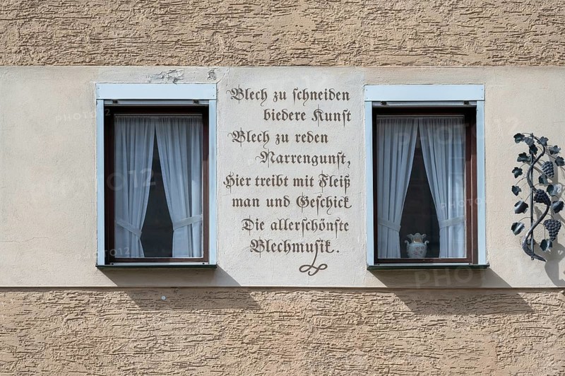Slogan on a house of a manufacturer of metal wind instruments, Iphofen, Lower Franconia, Bavaria, Germany, Europe
