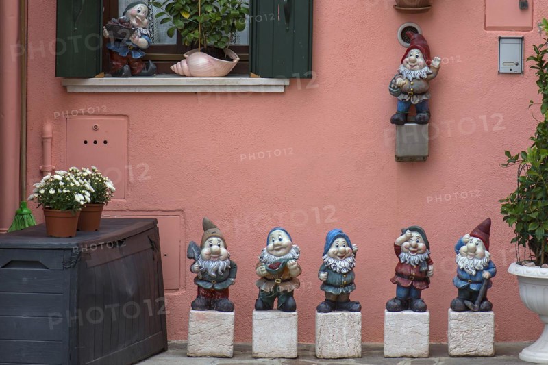 Garden gnomes in front of a house, Burano, Veneto, Italy, Europe
