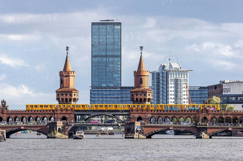 Oberbaum Bridge with underground, connection between the districts of Kreuzberg and Friedrichshain across the Spree, part of the city centre ring road. City view Berlin, Germany, Europe