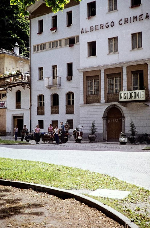 The travelling group of the Bromley Scooter Club stands in front of the Hotel Albergo Crimea, Chiavenna, Lombardy, Italy, July 1959, Europe
