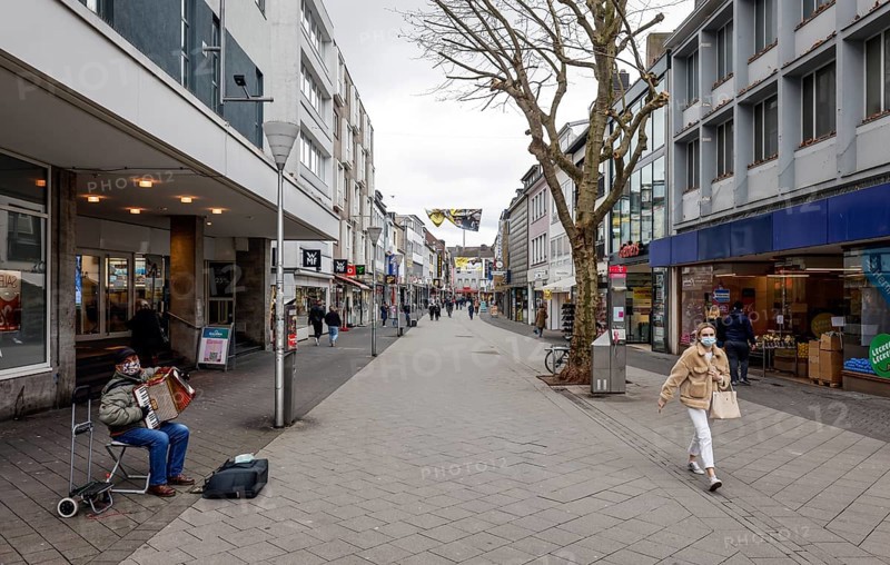 Düren, North Rhine-Westphalia, Germany - Düren city centre in times of the corona crisis during the second lockdown, most shops are closed, only a few passers-by are walking along Wirtelstrasse, the main shopping street. The district of Düren is one of the municipalities with the highest seven-day incidence in North Rhine-Westphalia. In addition, more than half of those infected there have contracted the British mutation of the coronavirus