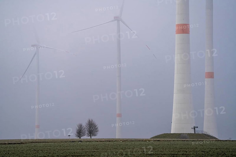 Wind farm in fog, dark doldrums, no wind no direct sunlight, in the Rhenish lignite mining area, south of the Garzweiler open-cast mine near Bedburg, North Rhine-Westphalia, Germany, Europe