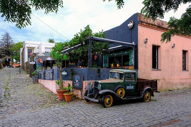 Colonia del Sacramento, Colonia, Uruguay, vintage cars parked in the alleyways of the old town. Colonia del Sacramento is a city on the Río de la Plata in Uruguay. It is the capital of the department of Colonia. Colonia del Sacramento is the oldest city in Uruguay and its historic centre, a popular tourist destination, has been declared a UNESCO World Heritage Site, South America
