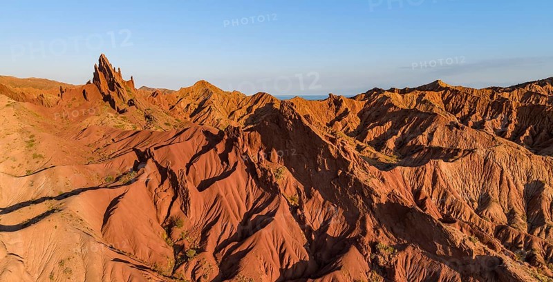 Aerial view, eroded mountain landscape, sandstone cliffs, canyon with red and orange rock formations, Farytale Canyon Skazka, Issyk Kul, Kyrgyzstan, Asia