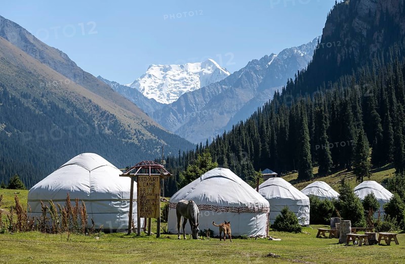Yurts in the mountain valley near Altyn Arashan, Kyrgyzstan, Asia