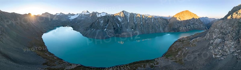 Mountain panorama, aerial view, 4000 metre peak with glacier, mountain pass and mountain lake Ala-Kul Lake, Tien Shan, Kyrgyzstan, Asia