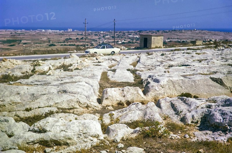 Prehistoric cart tracks crossing carboniferous limestone pavement, Malta, Europe 1971, Europe