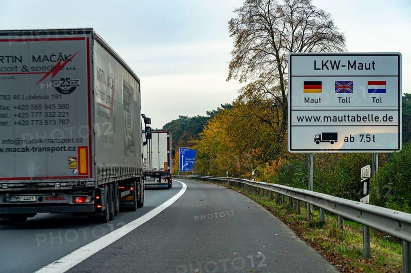 Sign for the lorry toll, on the A40 motorway, shortly after the German-Dutch border near Niederdorf, North Rhine-Westphalia, Germany, Europe