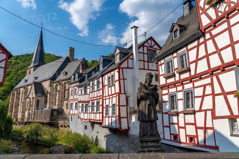 Monreal, idyllic half-timbered village in the Elz valley, figure of Nepomuk, the bridge saint, in the district of Mayen-Koblenz in Rhineland-Palatinate, Germany, Europe