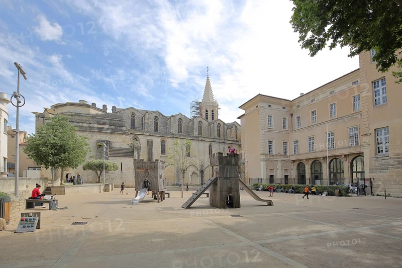 Romanesque church of St-Siffrein and children's playground, Saint, Carpentras, Vaucluse, Provence, France, Europe