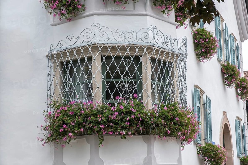 Traditional house with bay window, floral decoration, Eppan, South Tyrol, Italy, Europe