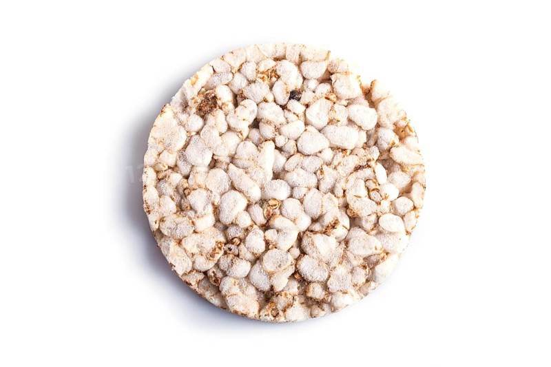 Single rice cake isolated on white background. close up