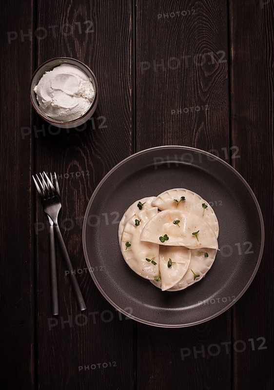 Pierogi, a traditional dish of Polish cuisine, dumplings, top view, close-up, no people