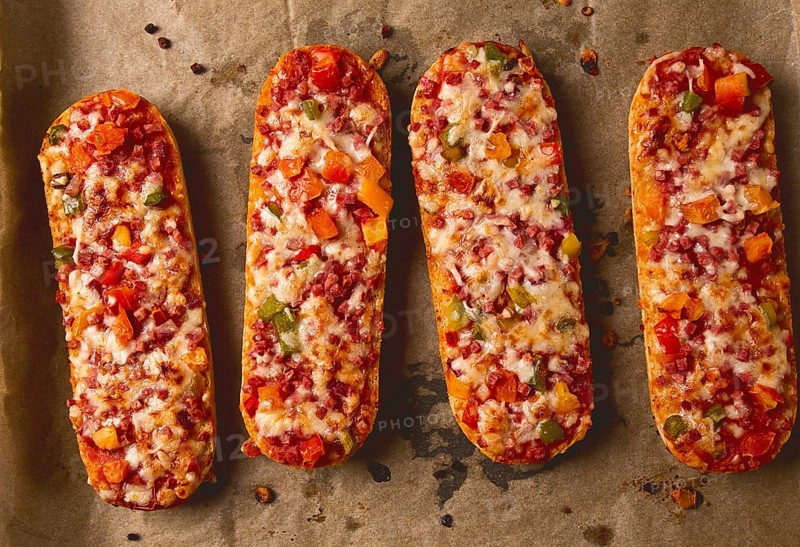 Pizza on a baguette, top view, close-up, no people, fast food, street food