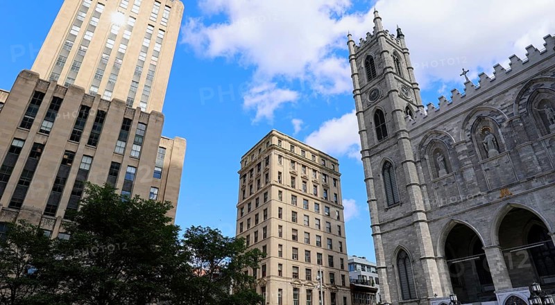 Place d'Armes square and Notre-Dame Basilica in Old Montreal historic town near Old Port