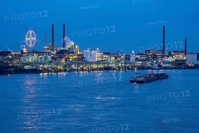 Backdrop of Chempark Leverkusen, Bayer Leverkusen, chemical park, chemical plant, river Rhine, cargo ship, Leverkusen, North Rhine-Westphalia, Germany, Europe