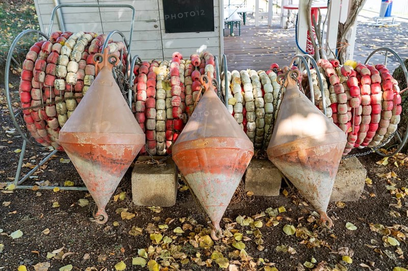 End of the season, separating line with floats, rolled up, used to demarcate the swimming area in a lake, Edersee, buoys